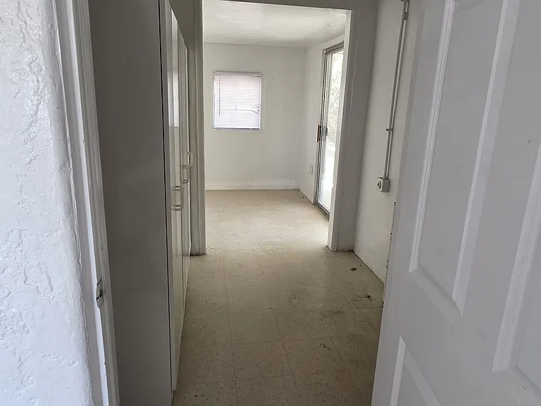 Large washroom with small patio room