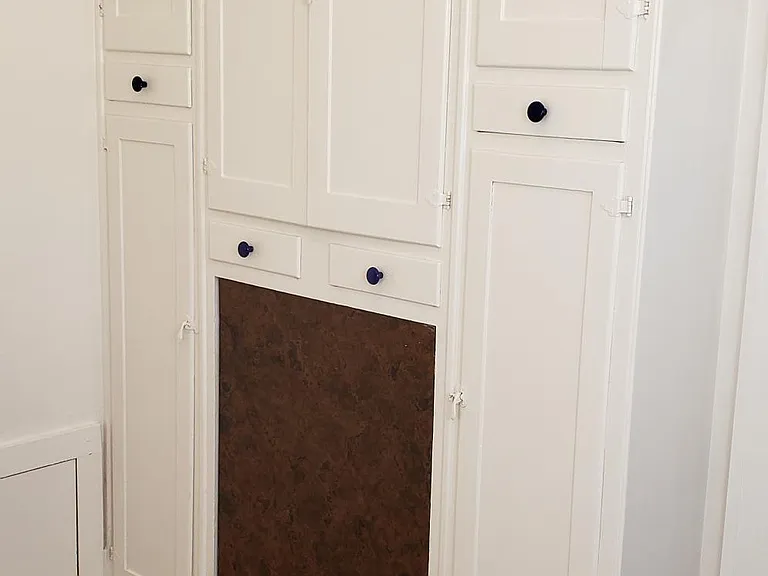 Entire wall of kitchen cabinets & fold down table