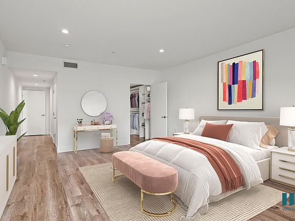 Bedroom with Walk-In Closet with Built-In Organizers