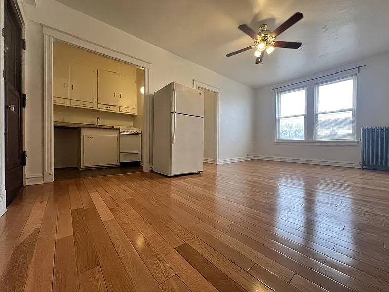 Hardwood flooring in living areas.