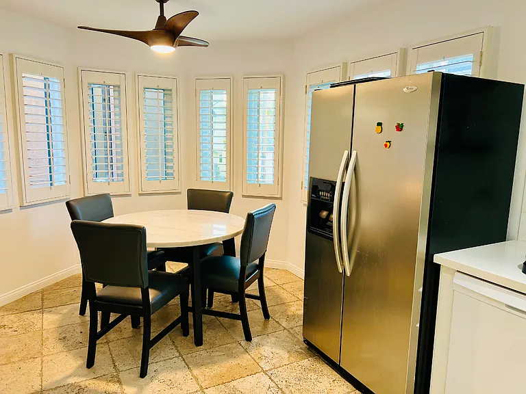 The refrigerator has water and ice dispenser