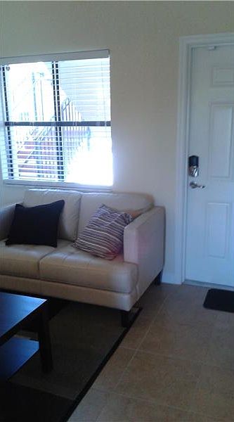 1st image of 22561 SW 88th Pl Unit 104-7