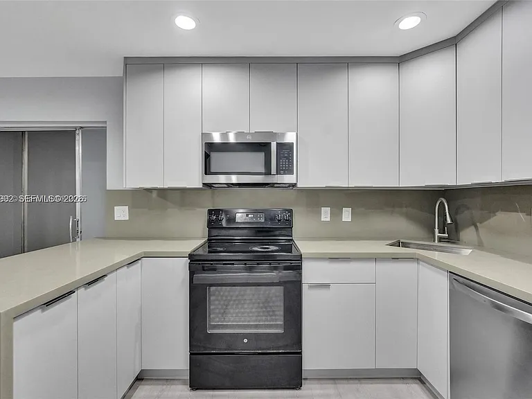 5963 NW 25th Ct #210 — Photo 13
