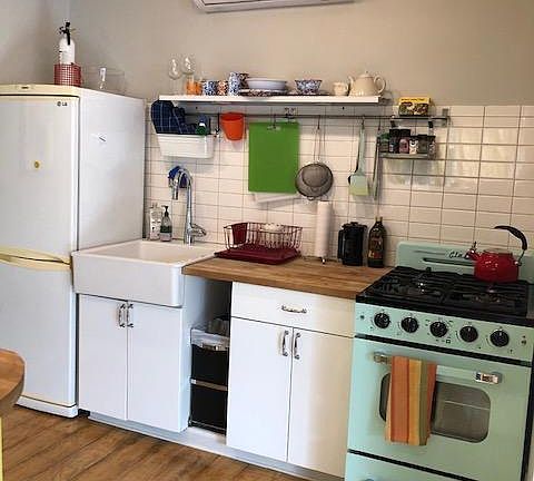 kitchen with gas stove,fridge,microwave