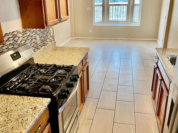 Granite Kitchen with Stainless Steel Appliances