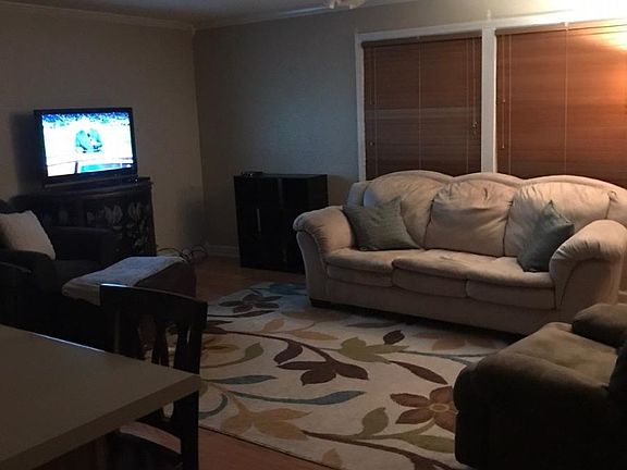 Open living space connected to kitchen