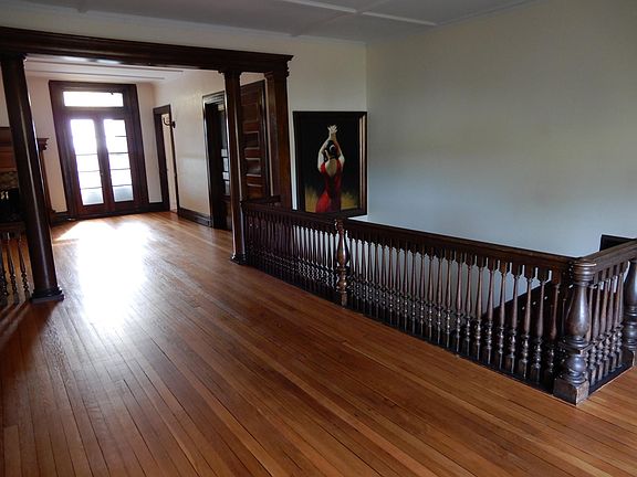 Sun-filled great room, original hardwood floors and period detailing