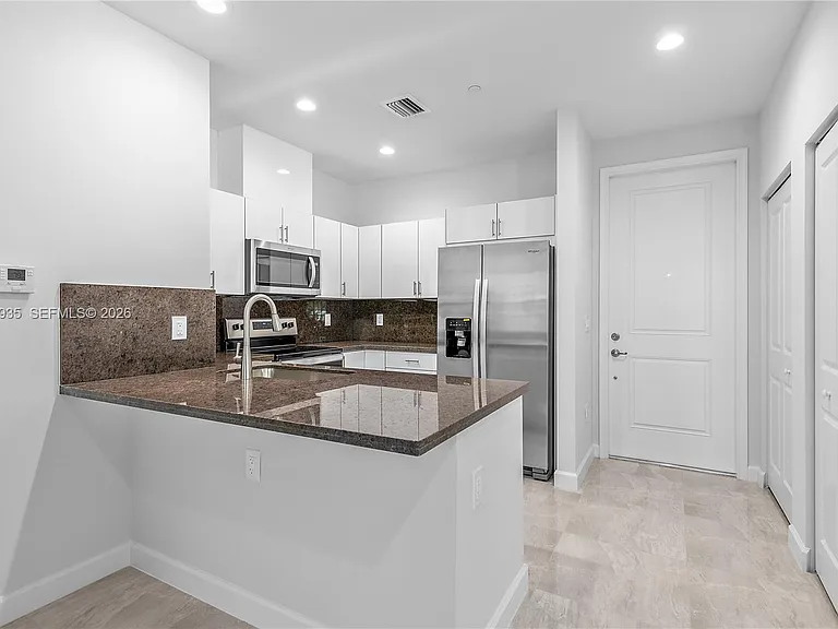 5745 SW 44th Ct #101 — Photo 12