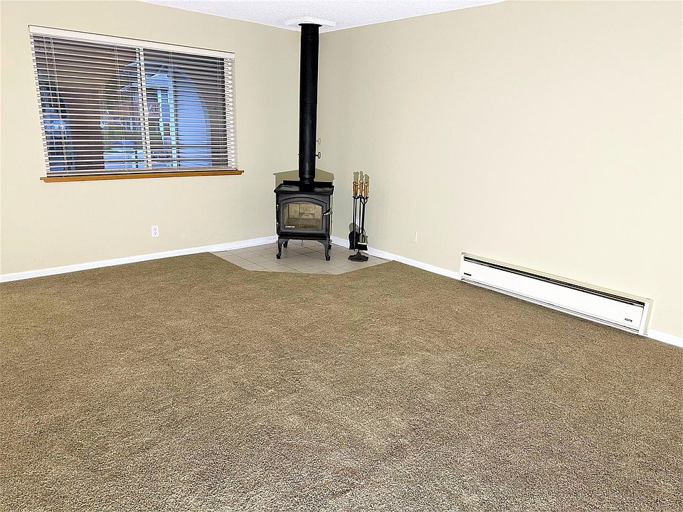 Large living room with wood burning stove
