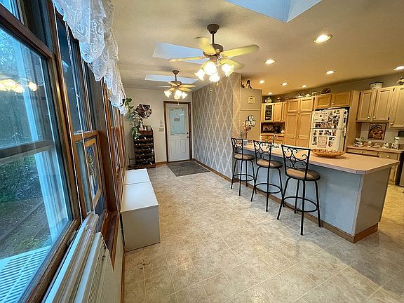 Entry opens to the kitchen