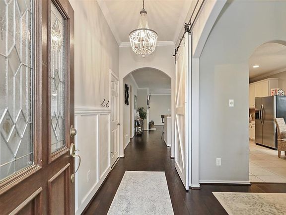 There's pretty updated lighting and paneling along the entry