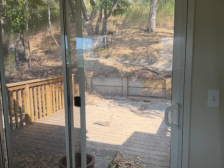 Sliding Door off Second Floor Looking into back yard