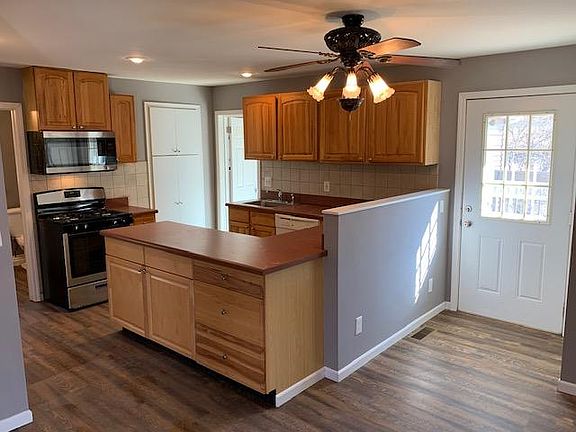 Kitchen with eat in area (232 SF) just right of photo
