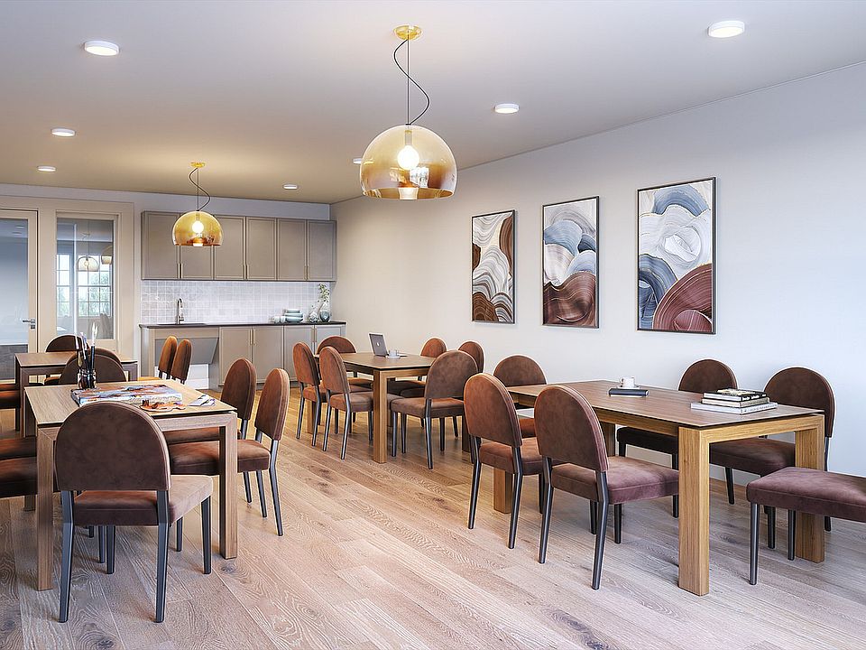 Experience the elegance of this contemporary dining and kitchen area, perfect for gatherings.