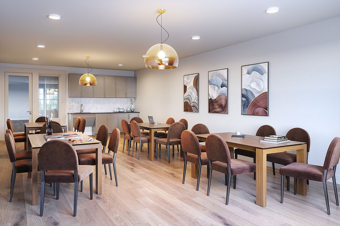 Experience the elegance of this contemporary dining and kitchen area, perfect for gatherings.