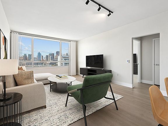 Signature Collection Phase I living room with hard surface flooring
