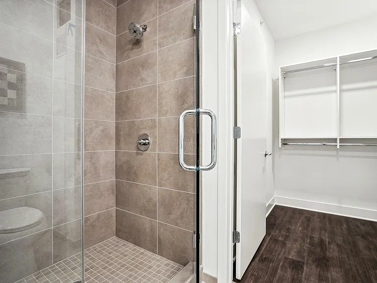 Fresh and functional _ a sleek bathroom where simplicity meets smart storage and refined style.