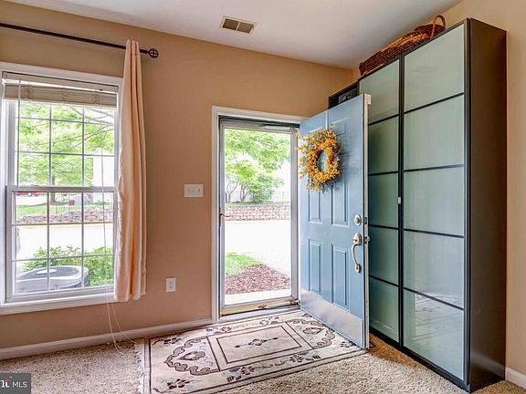 Enter the Main Level Family Room w/ Extra Closet