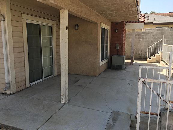 Patio sliding door and patio