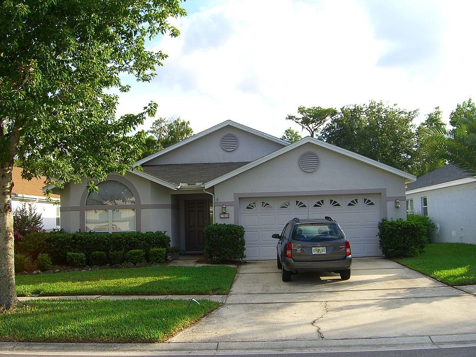 Home Photo 2006 - House since painted and new landscape