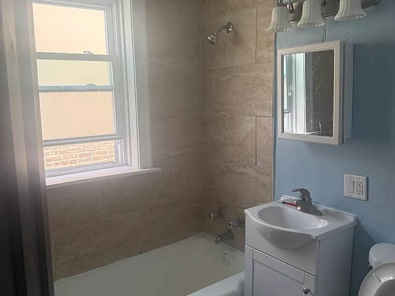 10921 S Vernon Ave — Photo 4