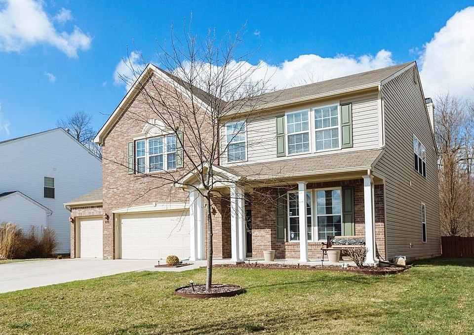 Welcome Home! Lovely 4 bedroom plus loft offers views of neighboring woods.