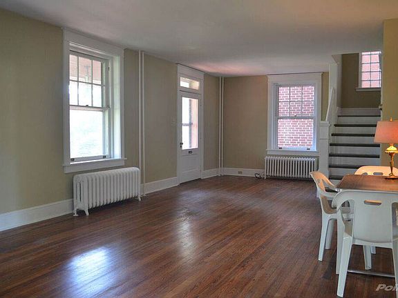 Large windows and wood floor