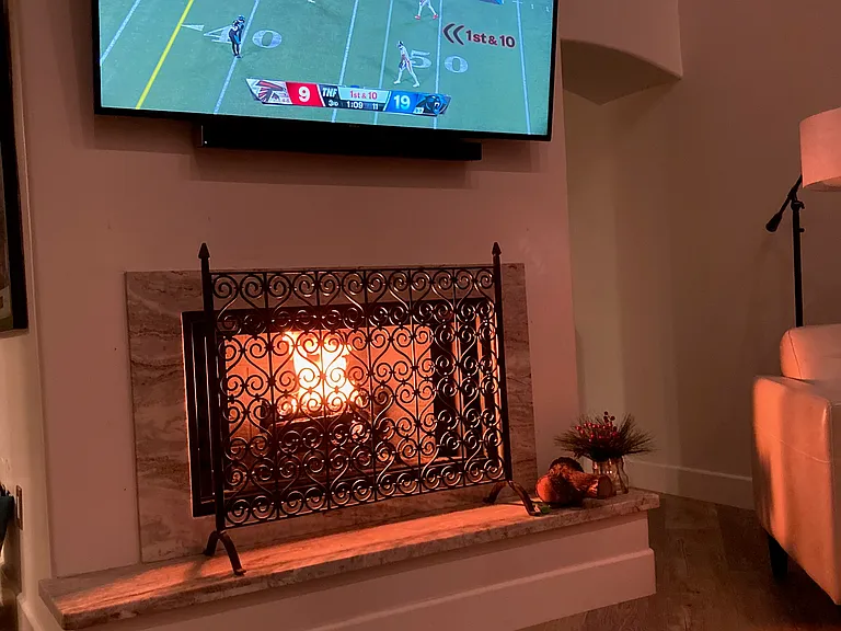 Big SMART TV with Apple and nice sound system. Real wood fireplace (you wont need in summer!)