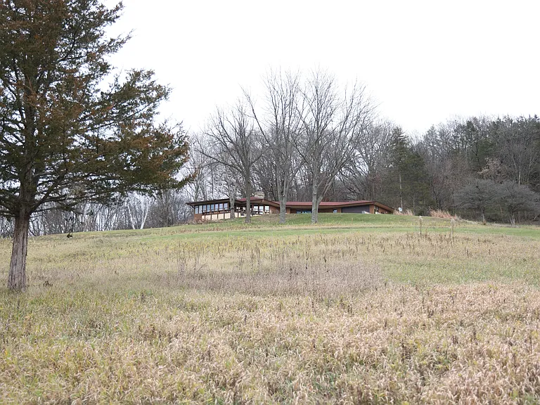Nestled on a scenic hillside, this home offers breathtaking views and plenty of open space to enjoy nature.