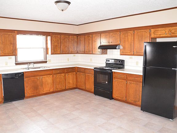 Kitchen has new appliances.