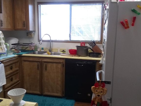 Kitchen. (Wall oven & new cooktop are obscured.)