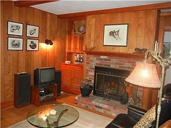 Main Floor Den, Brick Fireplace