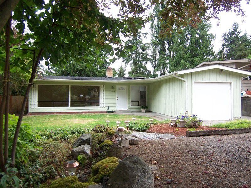 Lots of privacy with this one level home set back from the quiet street. Oversize West facing window