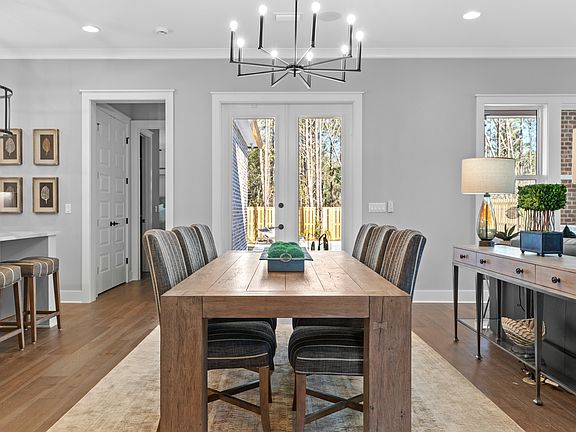 Photos are of a similar plan. Colors, finishes, upgrades and pricing may vary.
