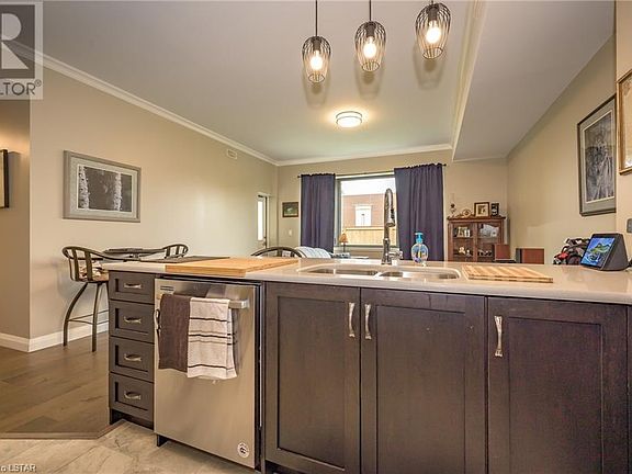 Overlook the living space while prepping in the kitchen.