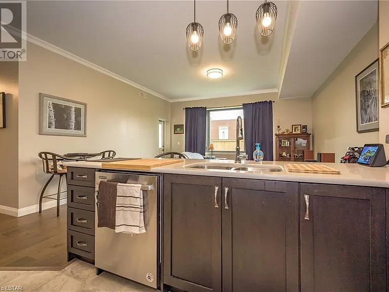 Overlook the living space while prepping in the kitchen.