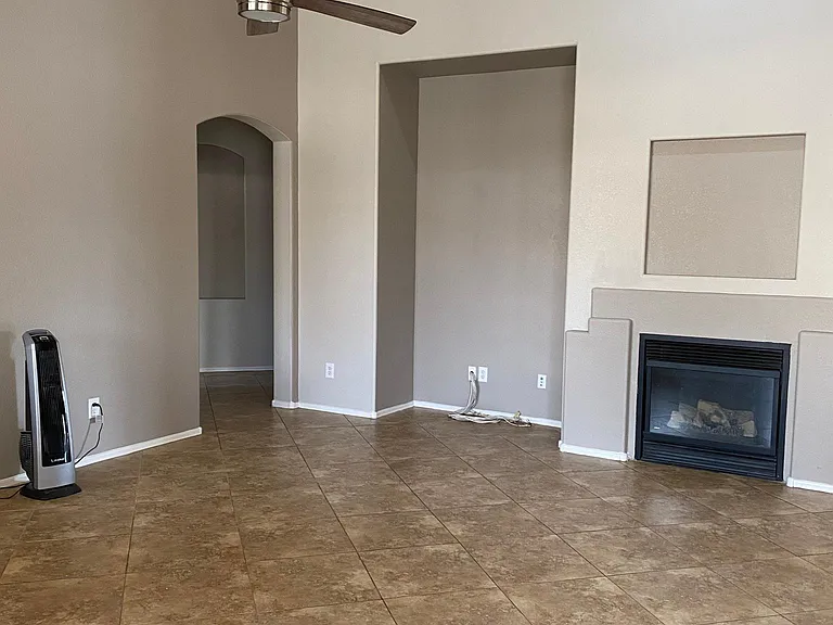 large family room with fireplace