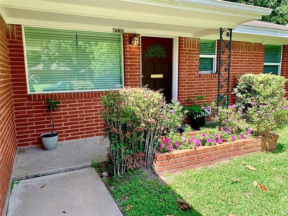 Inviting front porch entry. Double-paned windows. Hot water heater recently replaced. Blown-in insulation in attic & Nest Thermostat.