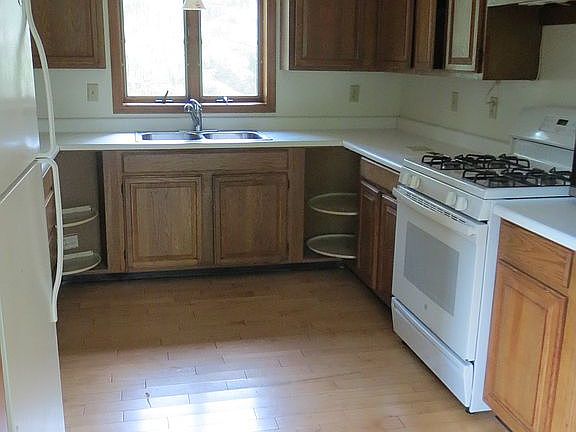 Kitchen with maple flooring