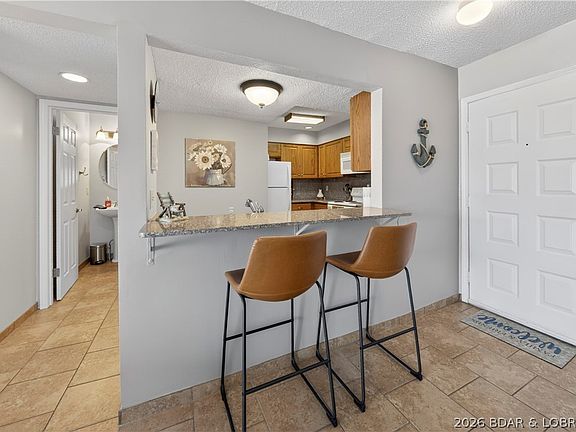 4th image of 5112 Osage Beach Pkwy #111 & 121