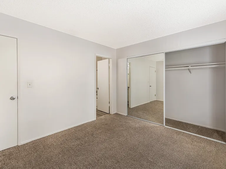 Sedona Apartments in Moreno Valley offers renovated units with updated bedrooms, plush carpet, and a primary bedroom featuring a private bathroom.