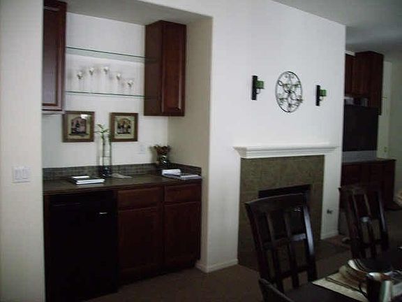 Built in bar next to fireplace