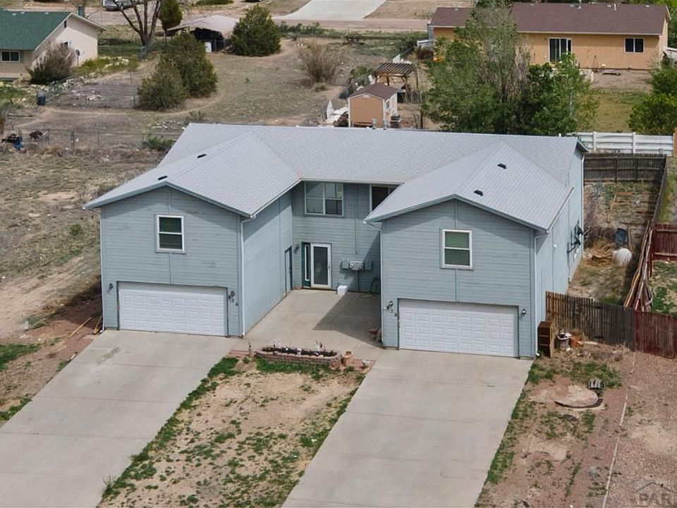Front of duplex prior to paint and landscaping