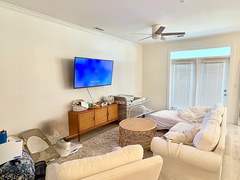 Living room laid out as the current tenants enjoy