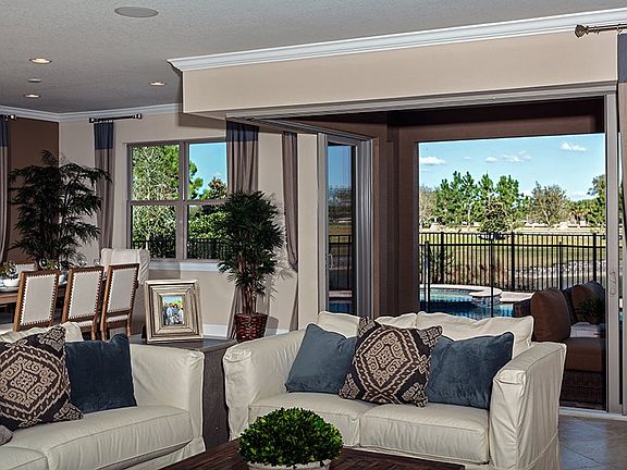 Gathering Room Overlooking Zero-Corner Slider Entry to Patio