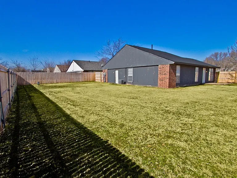 Let your kids or dogs roam in this massive back yard!