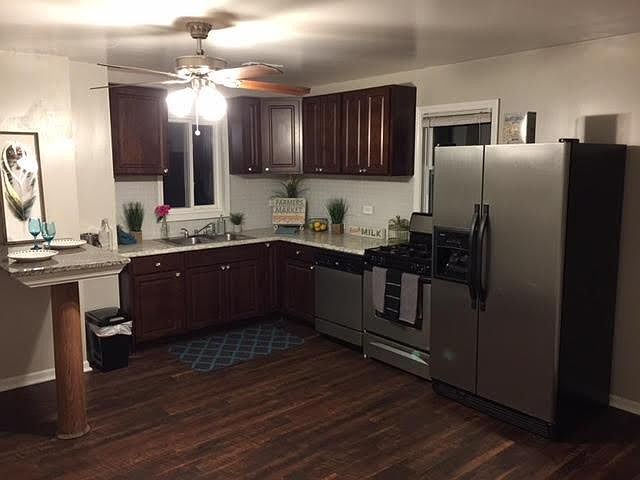 New coco cabinets and granite breakfast bar
