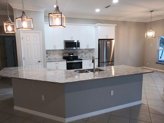 NEW LIGHT FIXTURES / NEW PLUMBING FIXTURES / NEW GRANITE