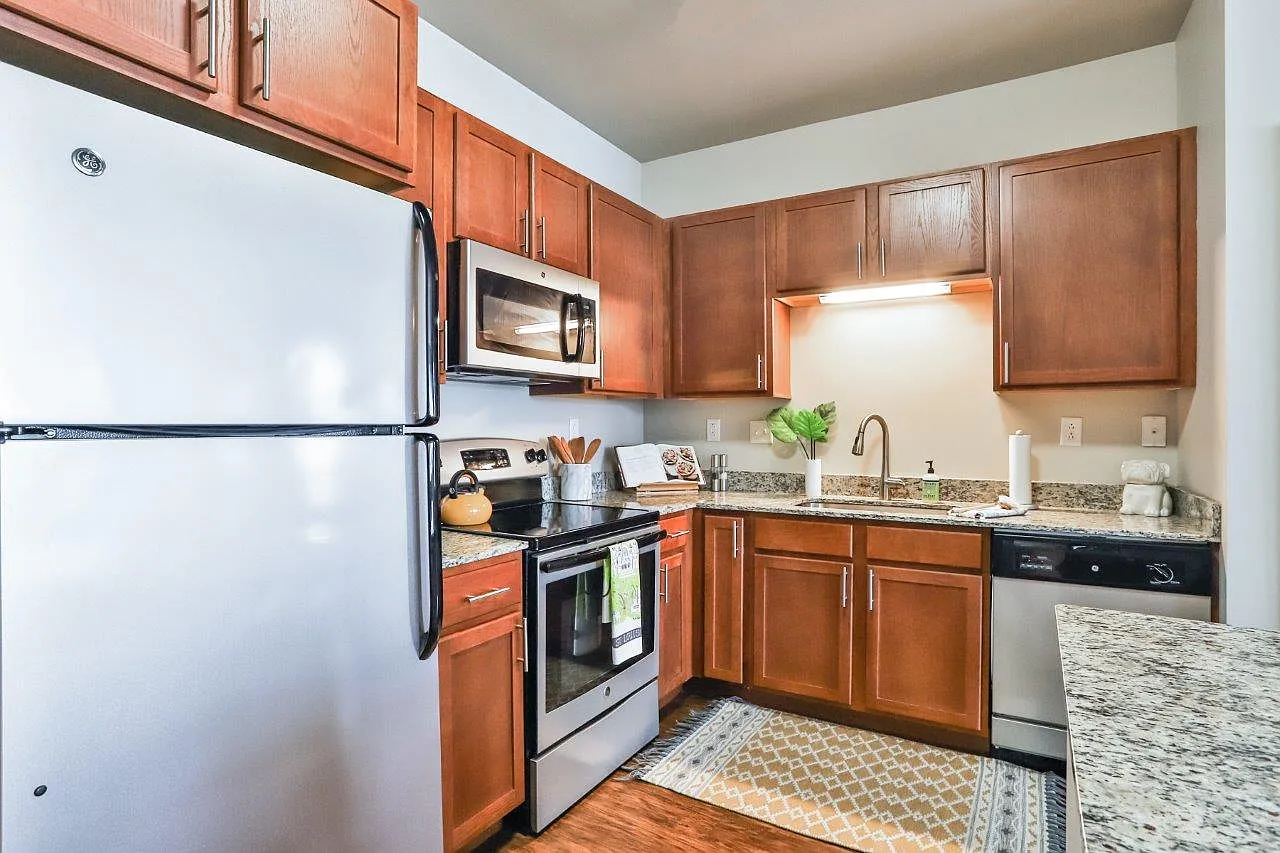 Residences at The Streets of St. Charles Apartment Homes — Photo 1