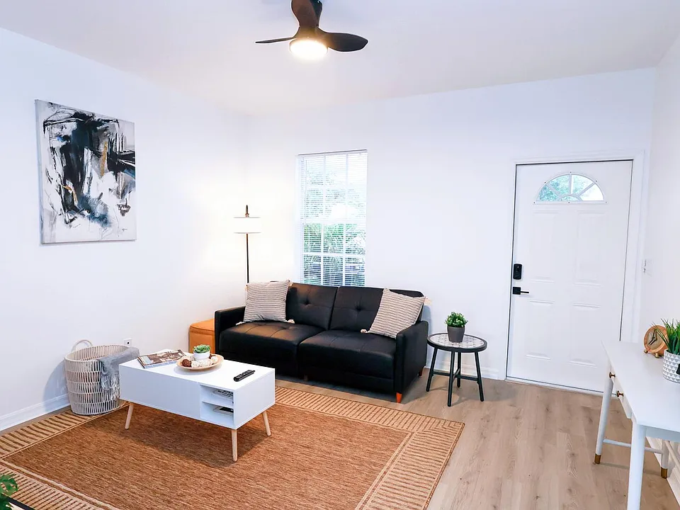 Spacious living room with a sofa/sleeper.